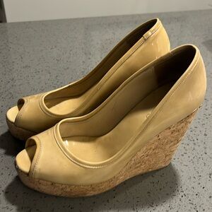 Slightly worn but stylish wedges for any night on the town. Enjoy!